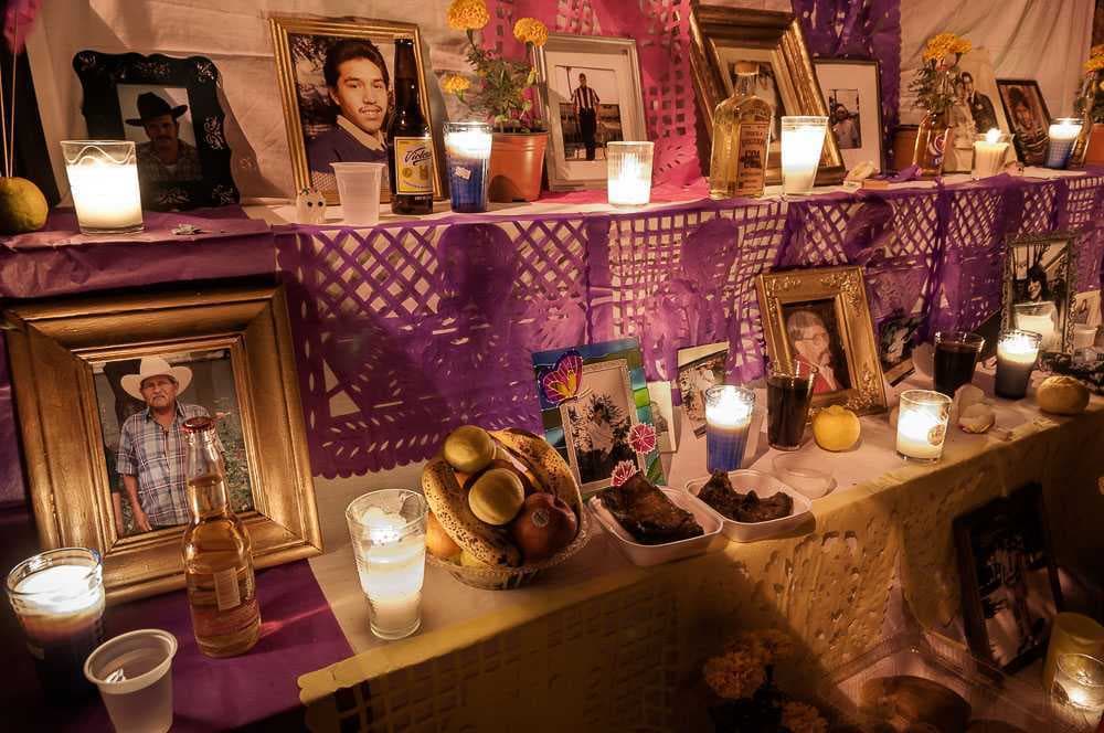 Some families set up altars privately in their homes. Others will build streetside altars such as this one.