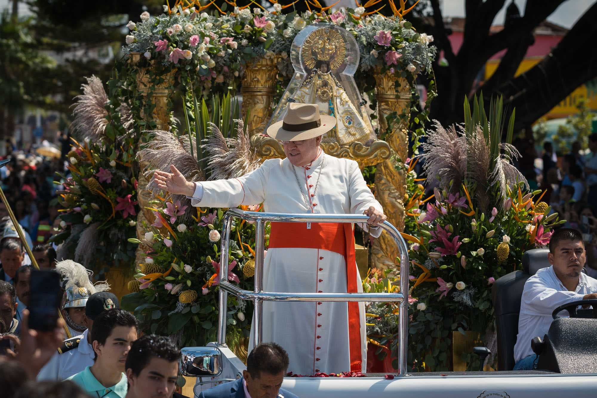 The statue of the Virgin of Zapopan arrives in Chapala in 2018, encased in a protective plastic shield.