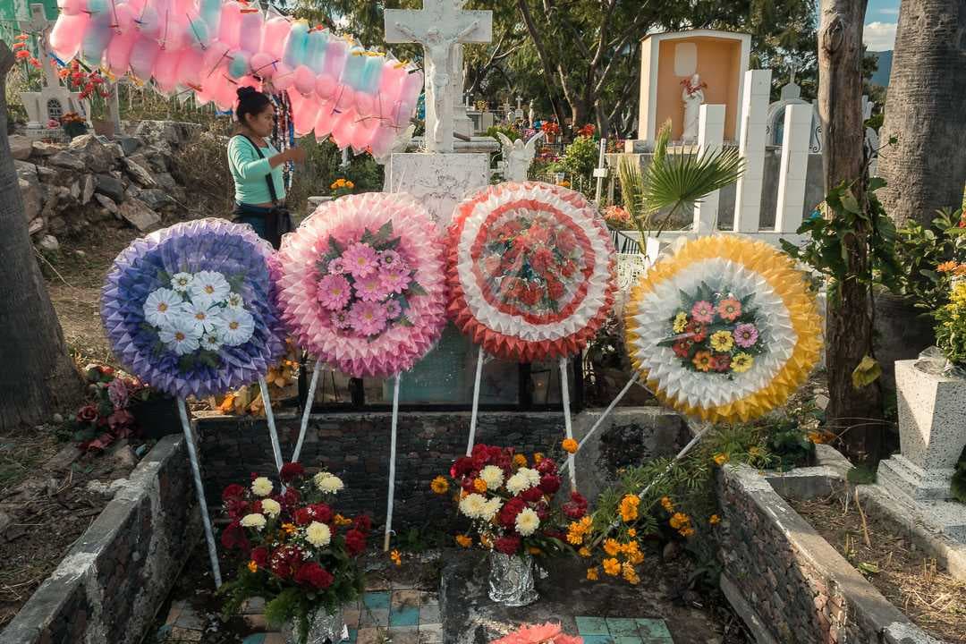 A woman sells cotton candy in the Chapala cemetery on the Day of the Dead.