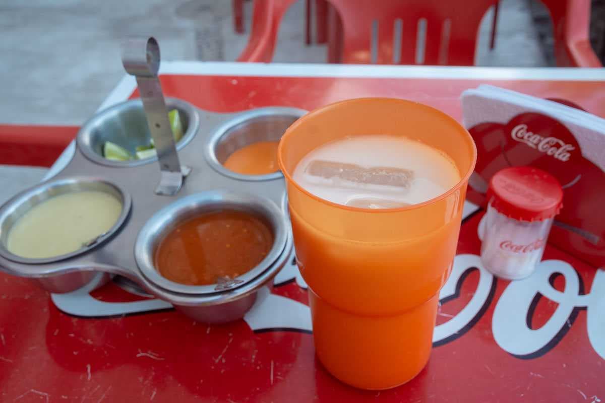 One or two aguas frescas are usually available. An agua fresca is a popular drink made with water and, usually, fruit. This is horchata: rice water, which tastes pretty much like rice milk. At Tacos Los Fabian, it's not too sweet.